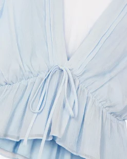 Blouse volantée bleue