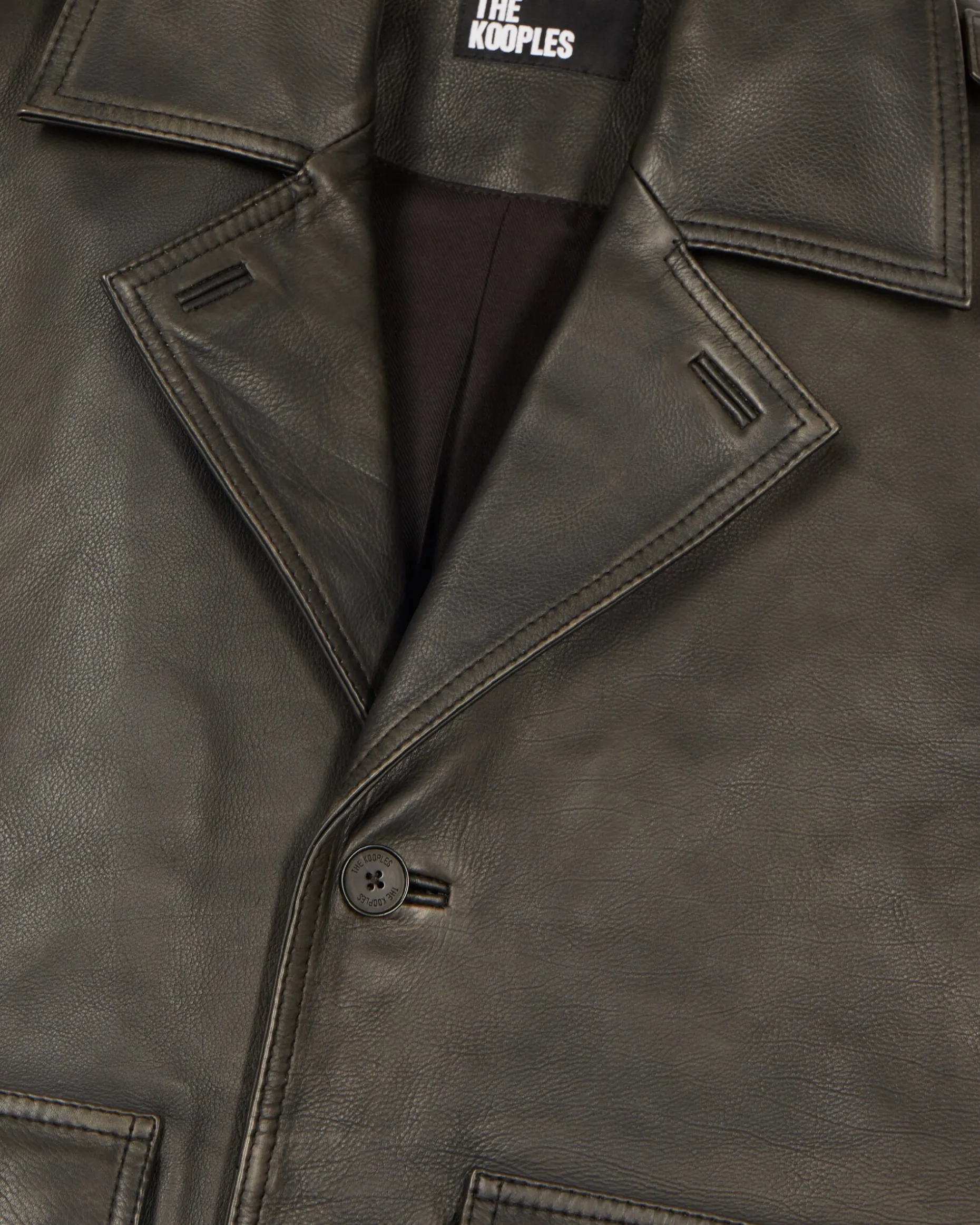 Blouson boutonné en cuir noir