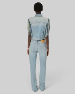 Blouson en denim avec franges et studs bleu