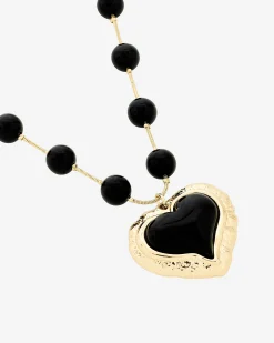 Collier perles et pendentif cœur noir