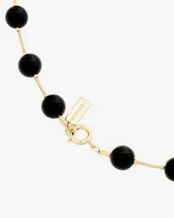 Collier perles et pendentif cœur noir