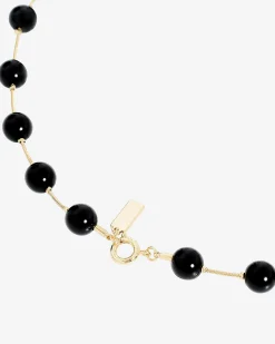 Collier perles et pendentif orange