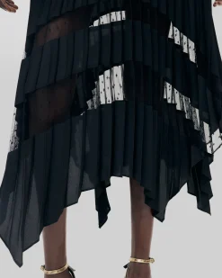 Jupe longue plissée avec dentelle noire