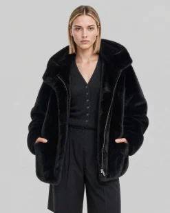 Manteau en fausse fourrure à capuche noir