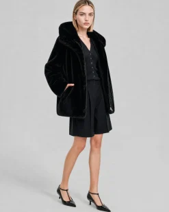 Manteau en fausse fourrure à capuche noir