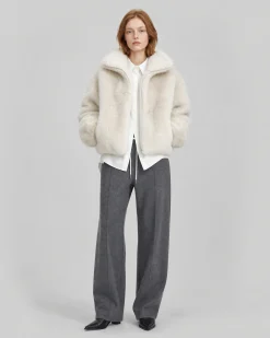 Manteau en fausse fourrure col montant ecru