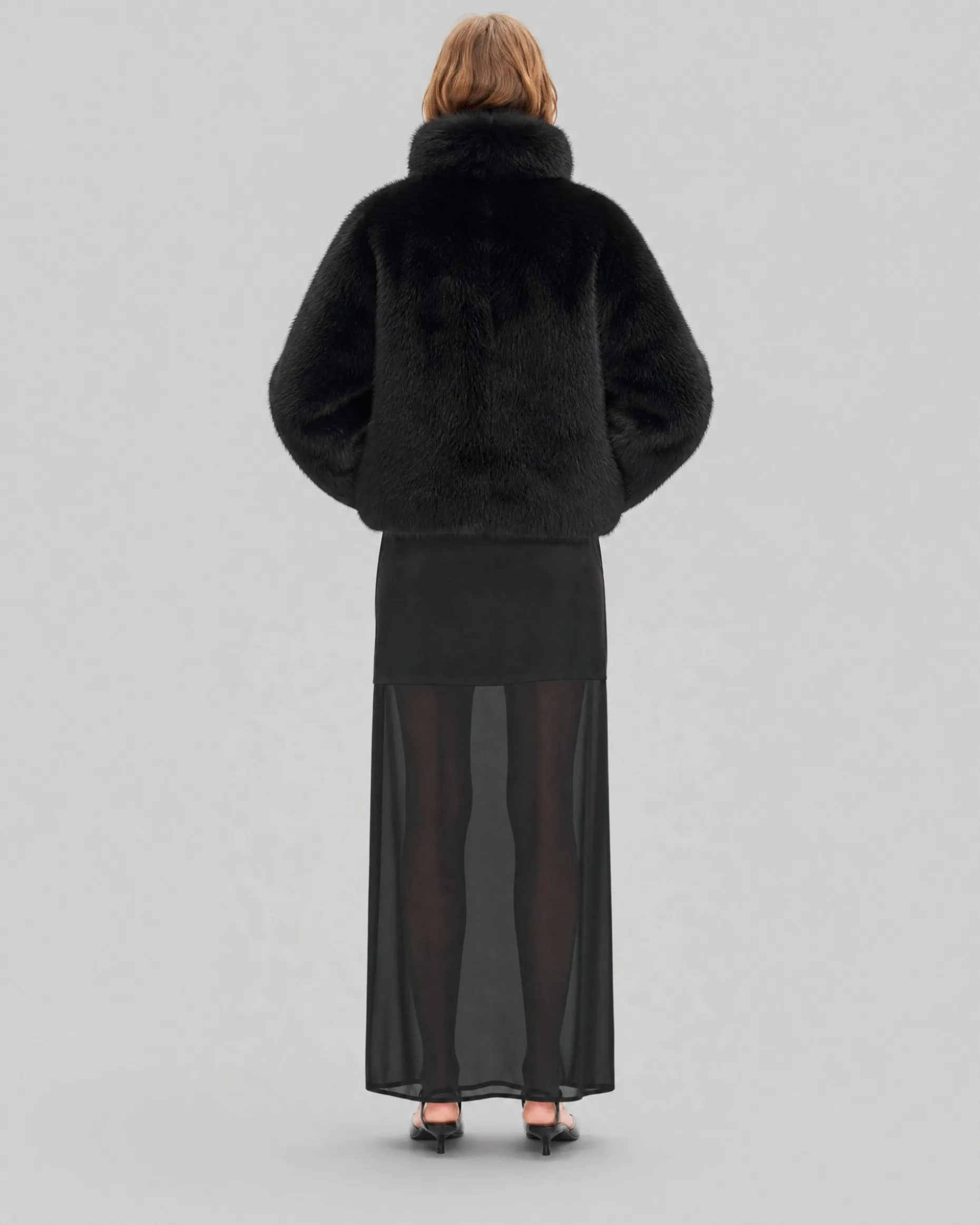 Manteau en fausse fourrure col montant noir