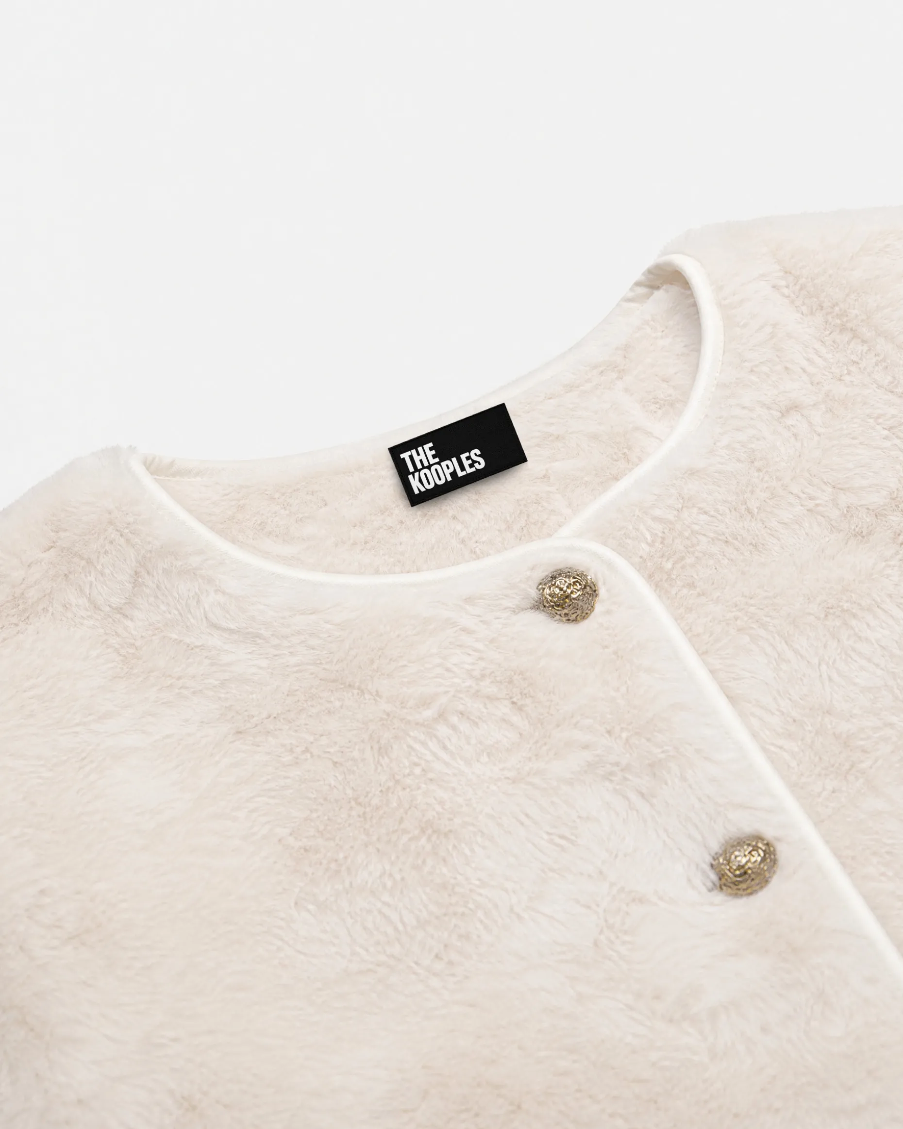 Manteau en fausse fourrure ecru