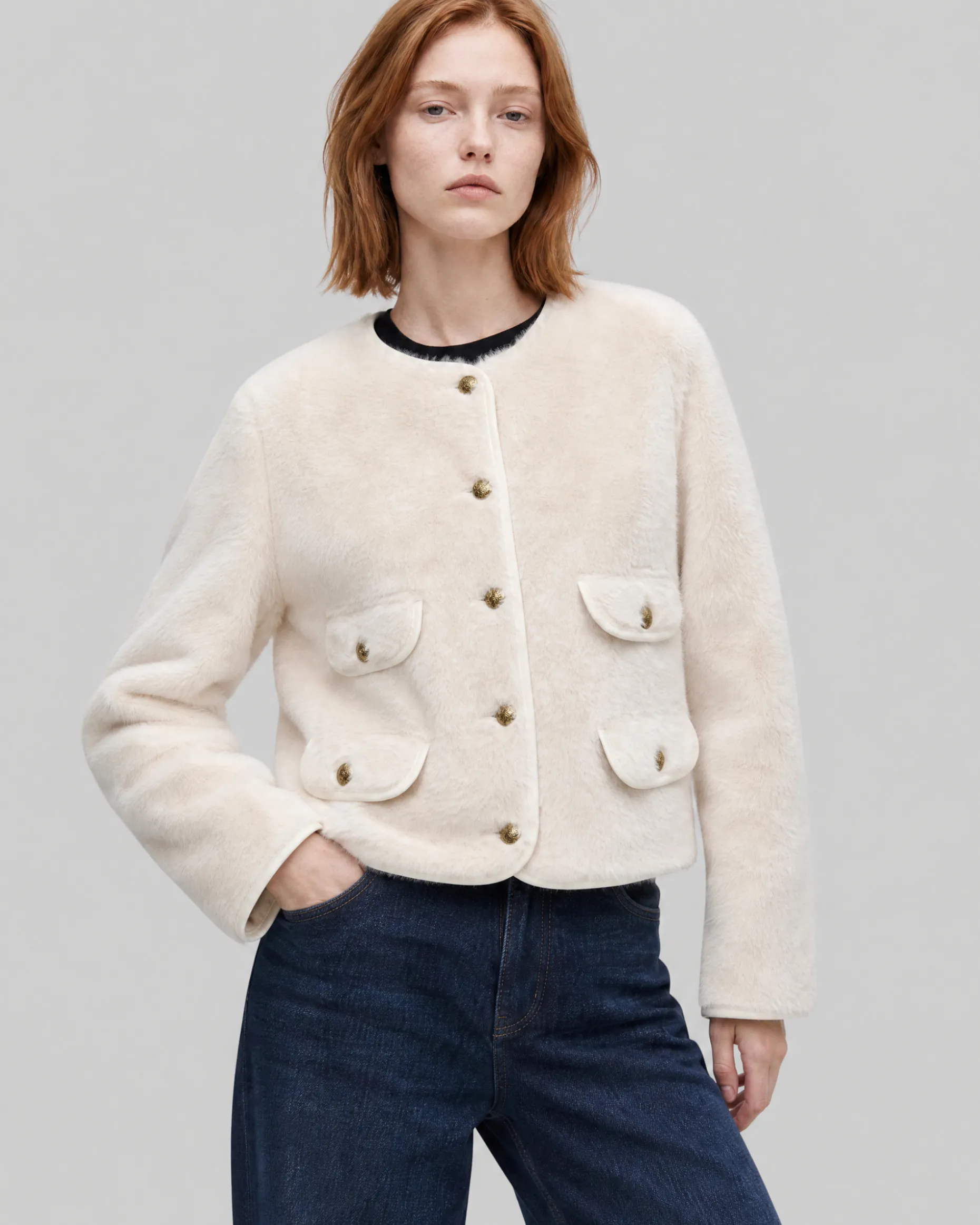 Manteau en fausse fourrure ecru