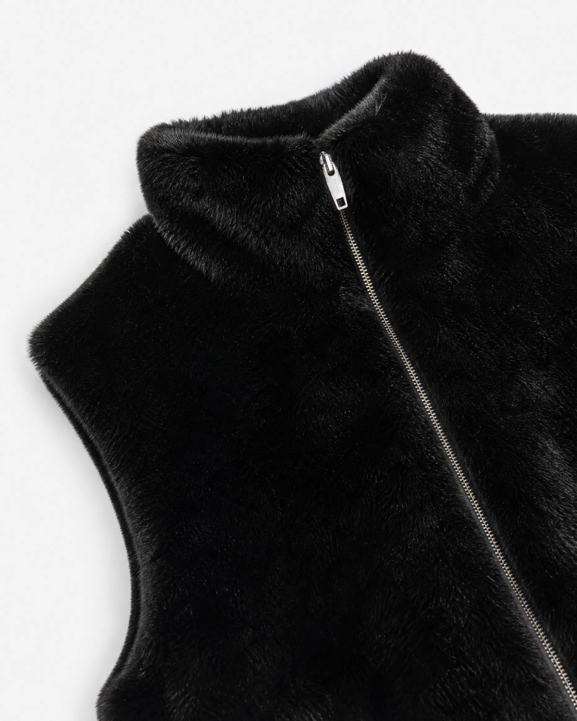 Manteau sans manches en fausse fourrure noir