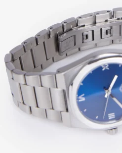 Montre avec Blazon argentée cadran bleu