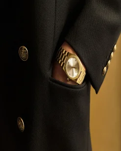 Montre avec Blazon dorée