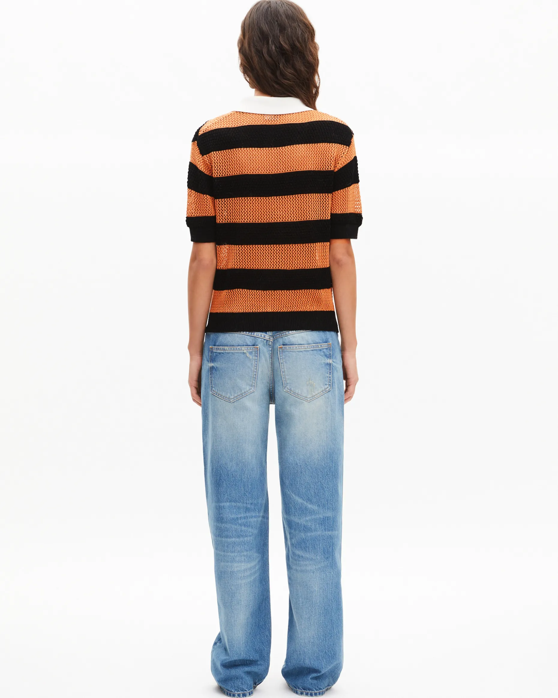 Polo en maille ajourée rayé orange et noir