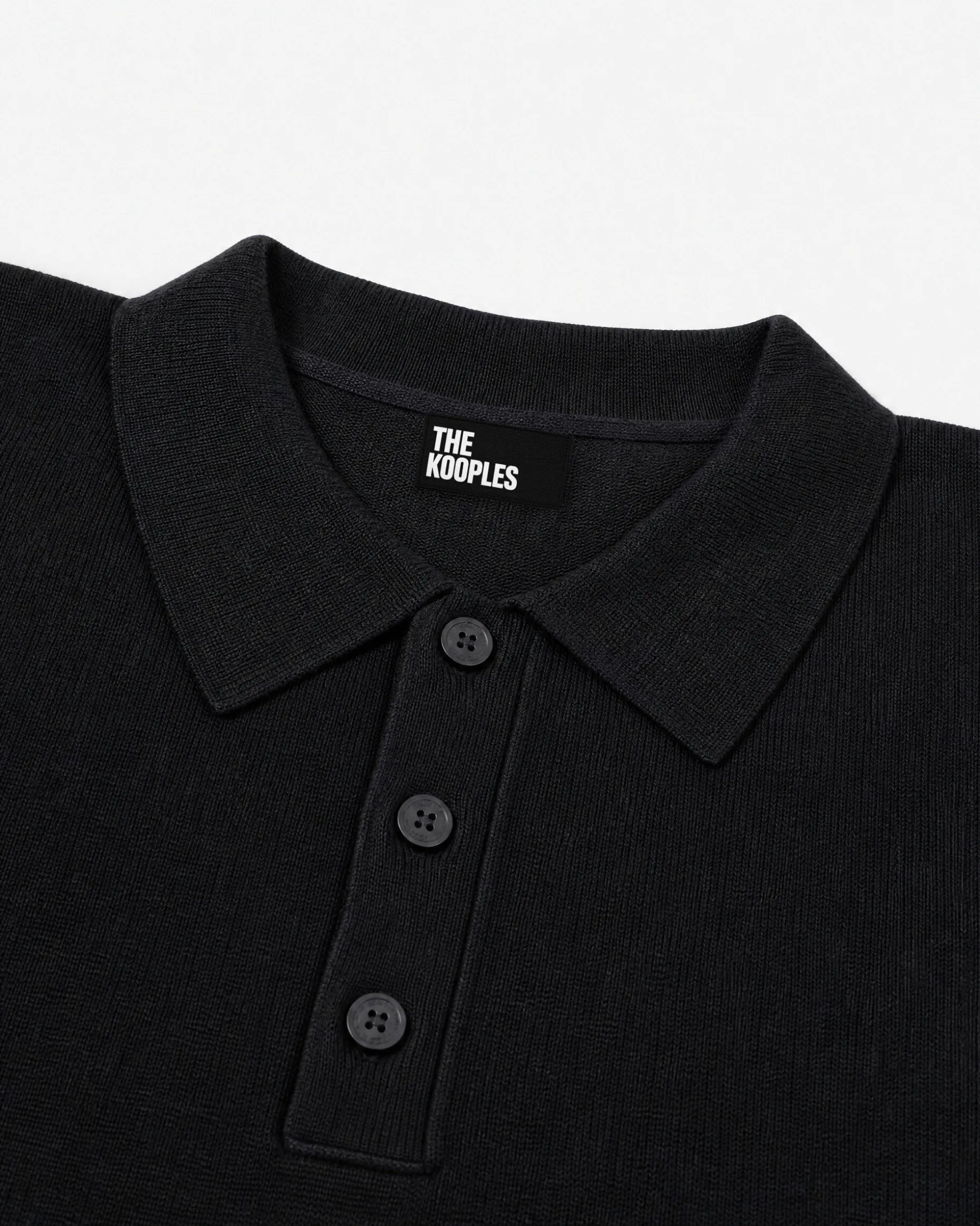Pull col polo en laine mérinos noir
