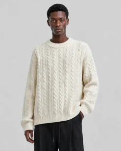Pull col rond torsadé en laine écru