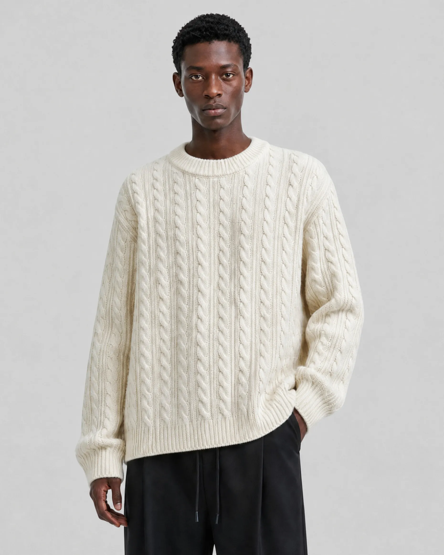 Pull col rond torsadé en laine écru