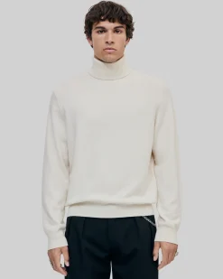 Pull col roulé en cachemire écru