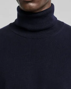 Pull col roulé en laine mérinos marine