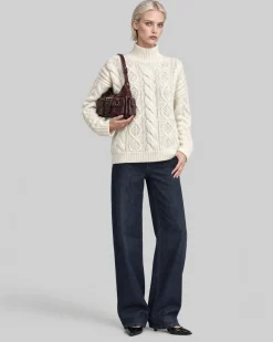 Pull en maille torsadée laine mérinos écru