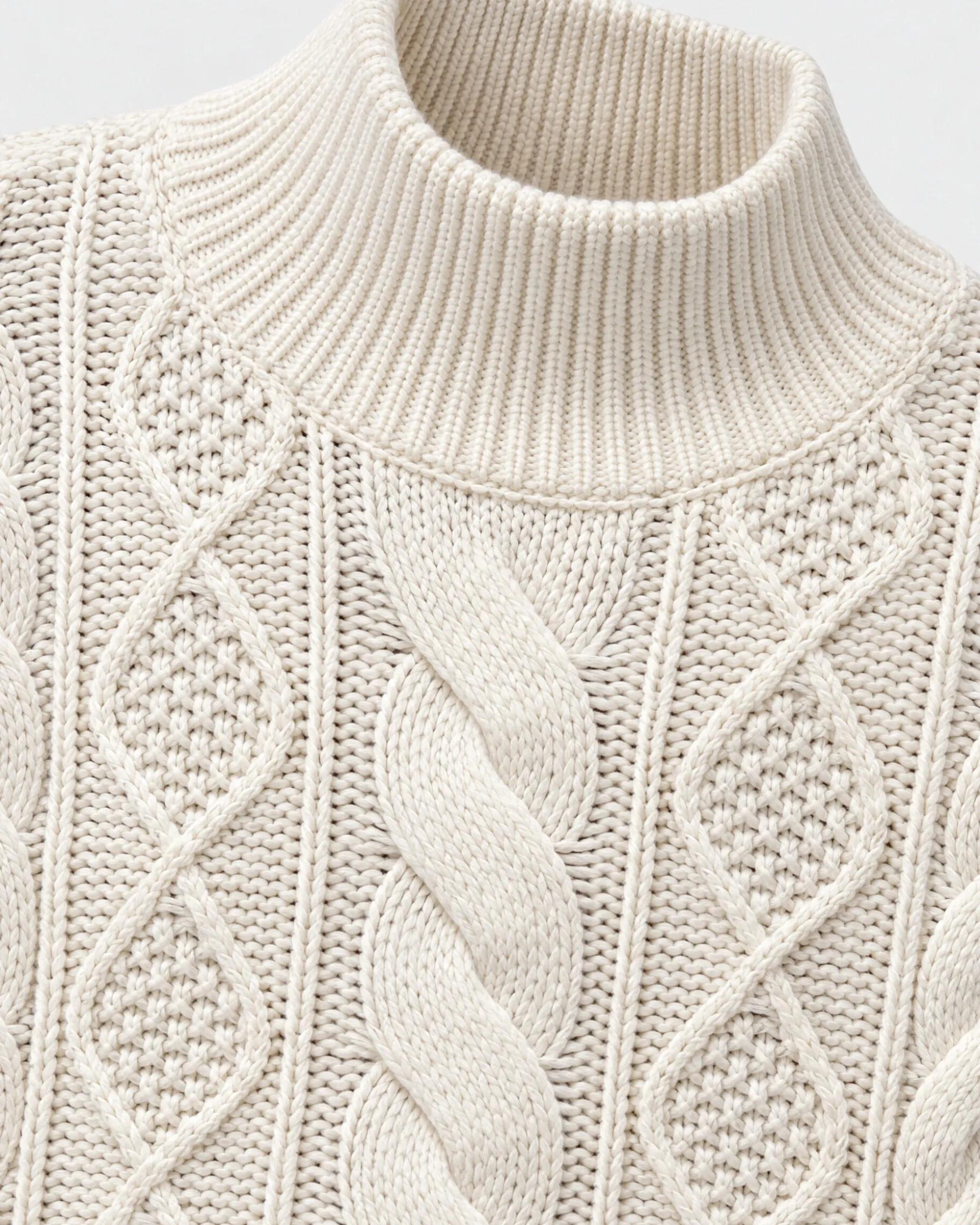 Pull en maille torsadée laine mérinos écru