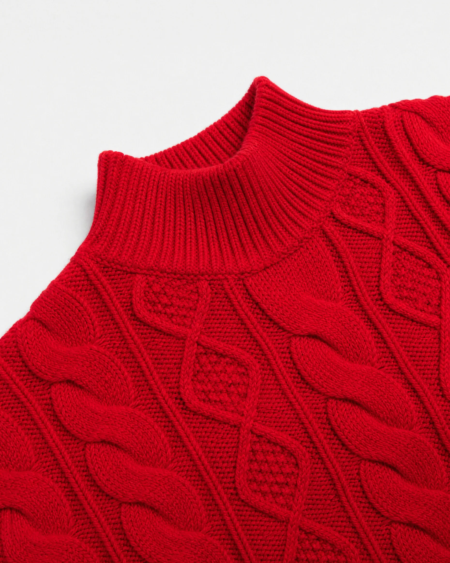 Pull en maille torsadée laine mérinos rouge