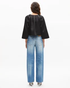 Veste courte effet cape en satin noire
