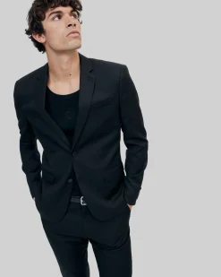 Veste de costume en laine noire coupe tailleur ajustée