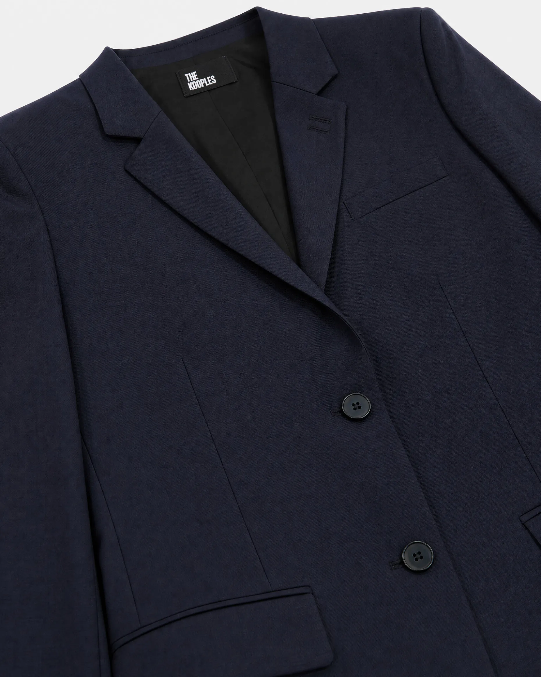 Veste tailleur en laine coupe cintrée bleu marine